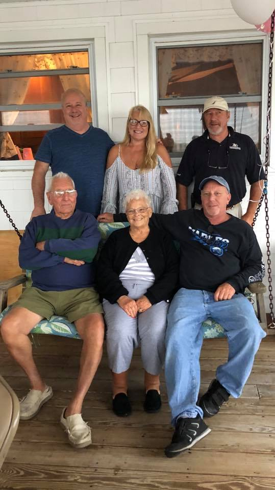 Don with his kids and family on the porch
